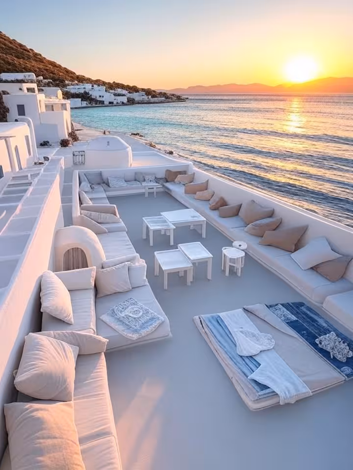 Greek Cycladic beach club architecture, whitewashed minimalist design, Mediterranean cushions and te