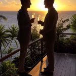 Elegant couple silhouette watching sunset from luxury private island deck, champagne glasses, tropic